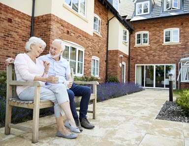 photo of couple at assisted living facility