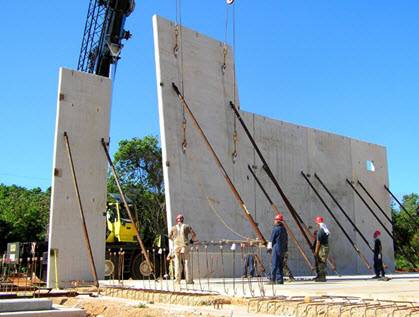 photo of tilt up concrete construction being  raised