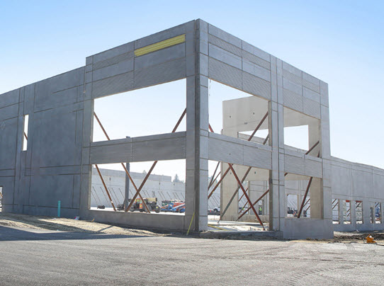 photo of concrete panels after being hoisted into place